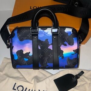 Louis Vuitton Keepall Bandouliere 25 in Sunset Monogram Eclipse Canvas BRAND NEW